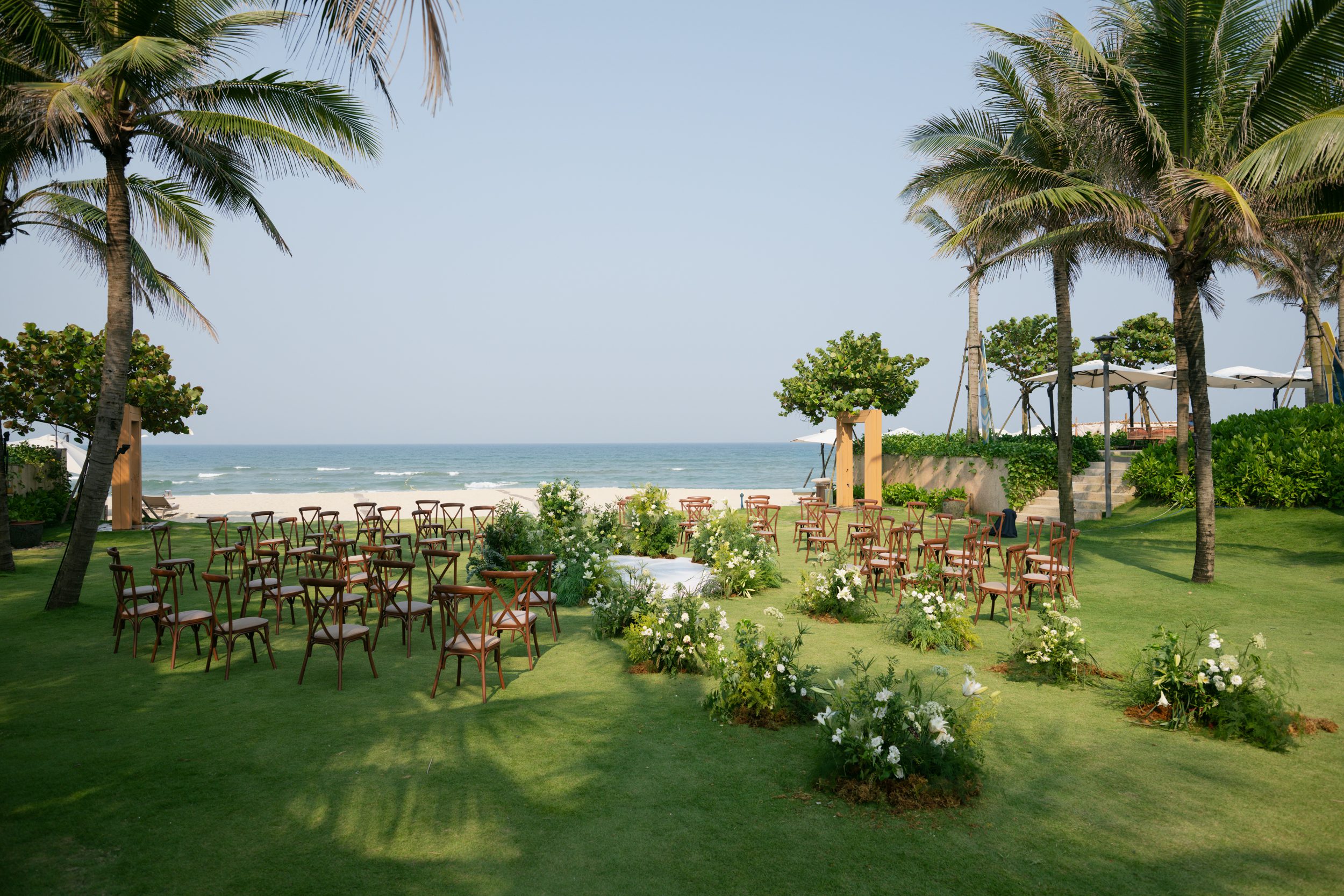 Golden hour view of the gardens and coastline at Fusion Resort Danang