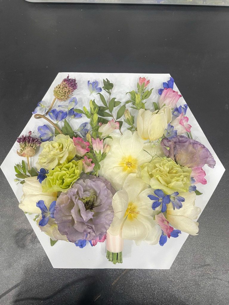 Dried wedding flowers arranged for epoxy resin preservation