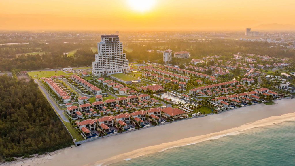 A bird's-eye view of Fusion Resort & Villas Da Nang, its beachfront villas stretching along the coast. Source: Danangfantasticity.com